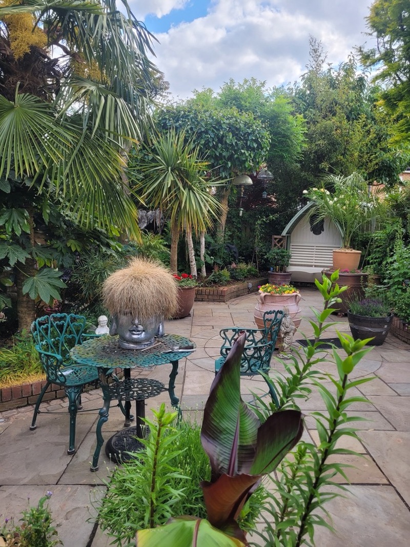 Other image for Barnsley’s Best Garden competition: Mick works his magic to water his ‘zen’ garden